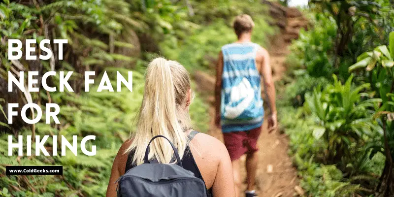 Man and woman hiking in the woods—Best Neck Fan for Hiking