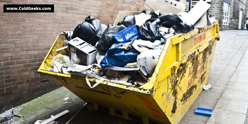 Yellow dumpster and trash—Can I throw a fan in the trash