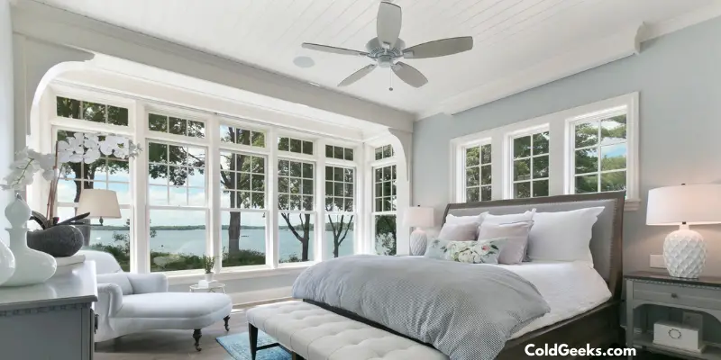 Grey themed bedroom by water—Where Can I Put a Fan